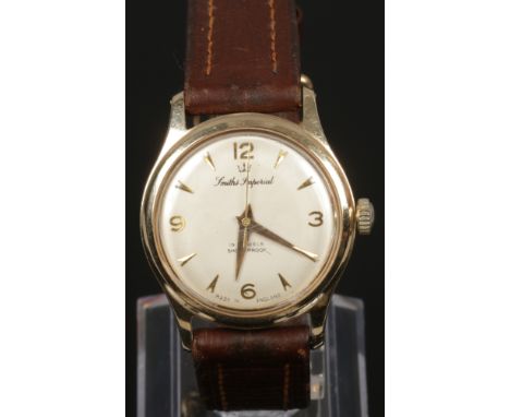 A cased presentation 9ct gold Smiths manual wristwatch with second sweep finger in original box. 