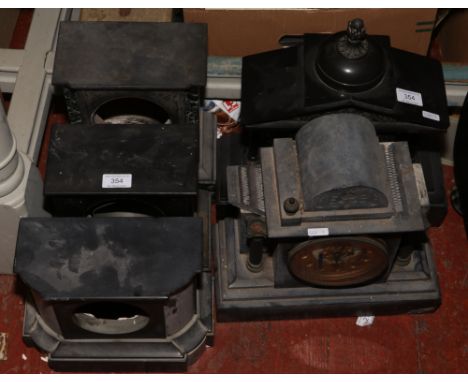 A quantity of slate mantle clock cases. 