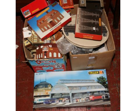 Two boxes of oo gauge rail superquick model kits, the swan, Supemarket, Greystones Farm etc to include Hornby R.530 pylons ki
