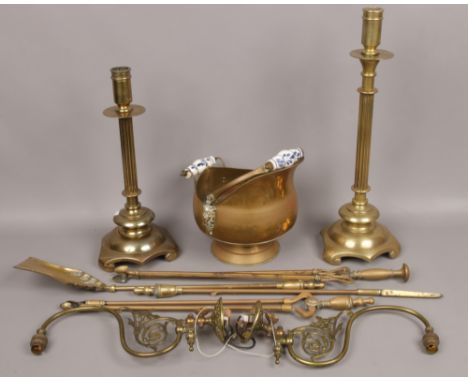 A collection of brasswares, coal scuttle with ceramic handles, large table lamp bases, wall light fittings etc. 