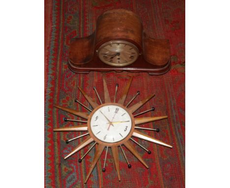 A Smiths sun wall clock along with a Westminster chime mantle clock. 