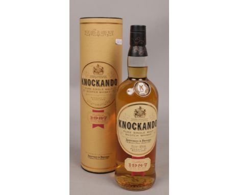 A full and sealed bottle of Knockando pure single malt Scotch Whisky 70cl. 