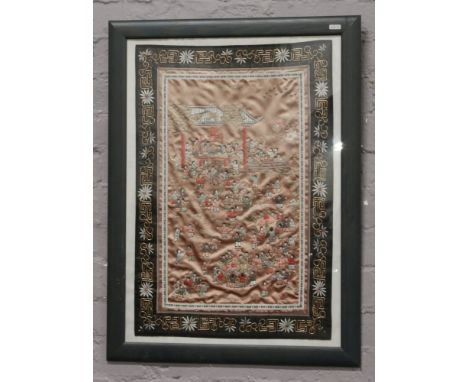 A framed Chinese embroidered silk panel. 