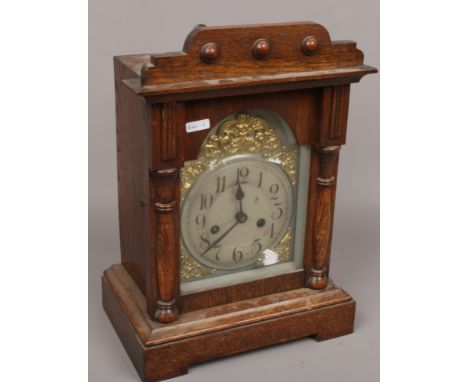 An oak cased mantle clock. 