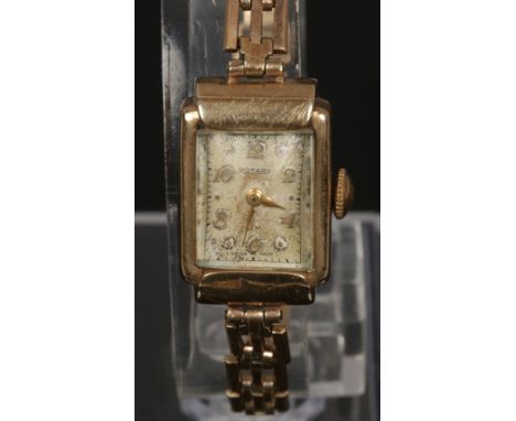 A ladies 9ct gold Rotary wristwatch with gold plated braclet strap, 12.45 grams gross weight. 