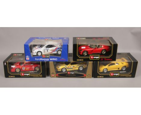 Five boxed Burago Diecast model sports and rally cars scale 1/18 to include Lamborghini Diablo 1990, Dodge Viper Ford Focus a