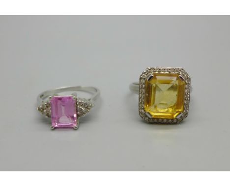 An 18ct white gold, yellow stone, diamond and ruby ring, 7.1g, Q, and a white metal stone set ring, R/S