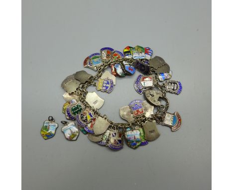 A silver and enamel charm bracelet, 66g 