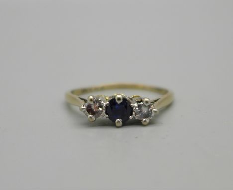 An 18ct gold sapphire and diamond trilogy ring, 2.7g, R 