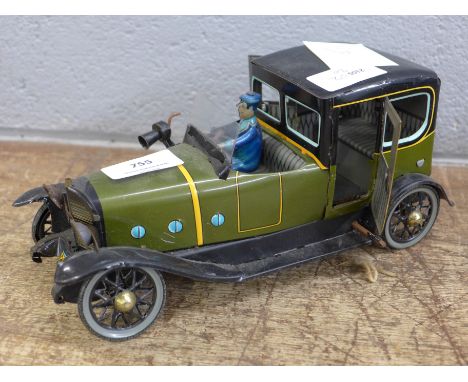 A vintage tin plate car 