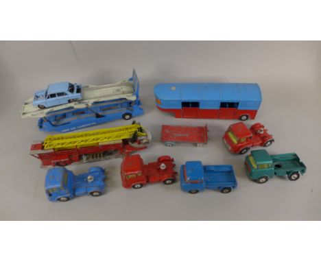 Assorted Corgi and Dinky Toys die-cast vehicles, including Corgi Transporter, playworn 