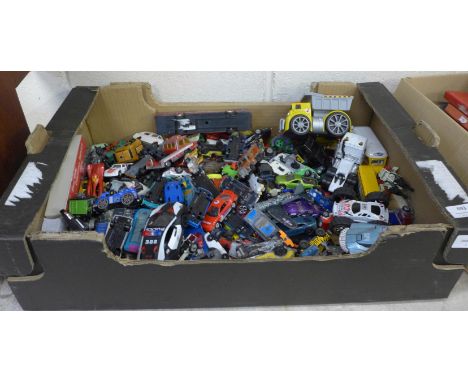 A box of playworn Dinky and Corgi die-cast model vehicles 