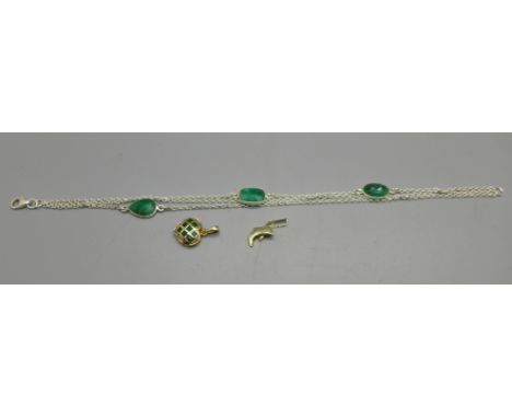 A silver and jade set bracelet, a yellow metal pendant stamped 'dia' and a 9ct gold dolphin pendant, tail a/f, 5.2g 