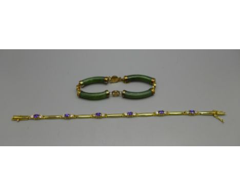 A jade bracelet and one other silver gilt bracelet 