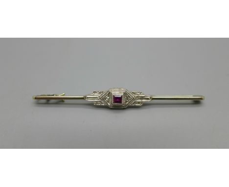 An Art Deco 18ct gold, ruby and rose cut diamond brooch, circa 1920, 5.5cm, 2.6g 
