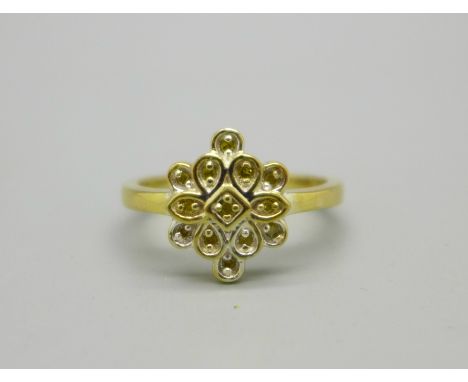 A silver gilt and yellow diamond cluster ring, R/S 