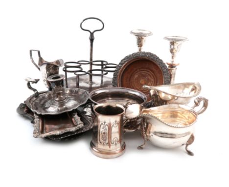 A collection of Old Sheffield plated and electroplated items, including: two three-bottle decanter frames, a pair of wine coa