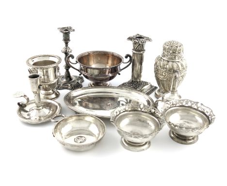 A mixed lot of silver items, various dates and makers, comprising: a Victorian caster, London 1897, a chamber stick, a teapot