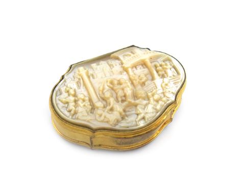 An 18th century gilt-metal mounted and mother-of-pearl snuff box, unmarked, circa 1760, cartouche form, the hinged cover carv