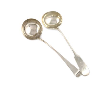 A Victorian silver Fiddle pattern soup ladle, by J. Whiting, London 1853, oval bowl, the terminal with a crest, plus a George