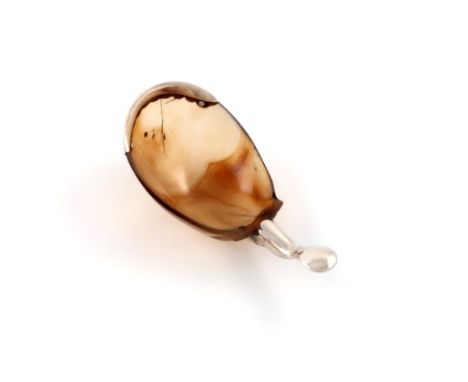 An unmarked silver and agate caddy spoon, probably 19th century, deep oval bowl with a plain mount and plain handle, old crac