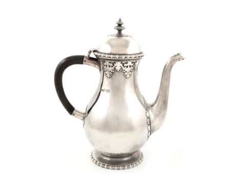 An Edwardian silver coffee pot, by Reid &amp; Sons, London 1909, baluster form, cut-card decoration, domed hinged cover with 