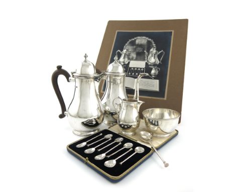 A four-piece silver coffee set, by Barraclough &amp; Sons, London 1934-36, baluster form, scroll handles, domed hinged covers