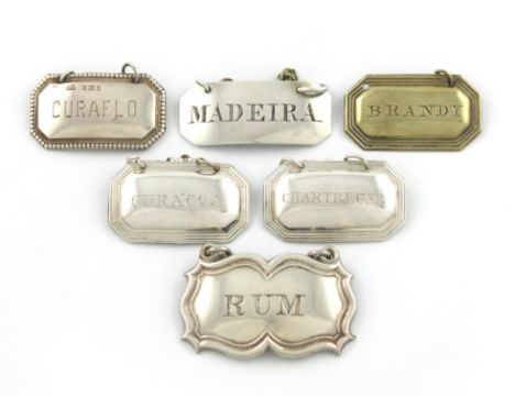 A collection of silver and electroplated wine labels, various dates and makers, some unmarked, broad rectangular form, titled