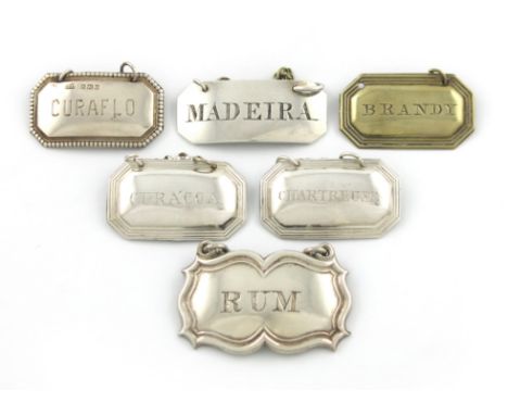 A collection of silver and electroplated wine labels, various dates and makers, some unmarked, broad rectangular form, titled