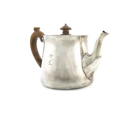 A George IV silver teapot, by Robert Garrard, London 1829, tapering circular form, flush-hinged cover with a wooden finial, a