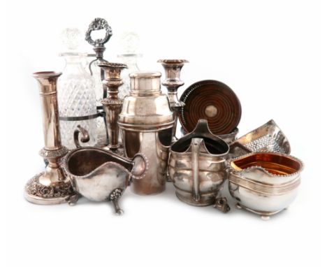 λA collection of old Sheffield plated and electroplated items, including: a three-bottle decanter frame, a pair of wine coast