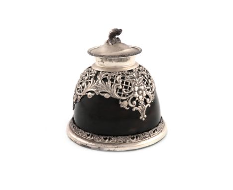 λAn Edwardian silver-mounted tortoiseshell inkwell, by Carrington and Co, London 1902 and 1904, raised circular form, with pi