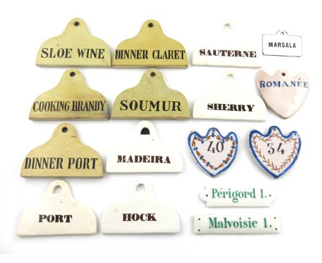 A collection of ceramic bin labels, various dates and designs, including a set of four 'HOCK', 'MADEIRA', 'SAUTERNE' and 'POR