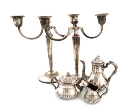 λA pair of Norwegian silver two-light candelabra, by David Andersen, Oslo circa 1920, tapering fluted circular columns, the s