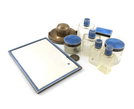 A silver-mounted and enamel glass dressing table set, with import marks for Finnigans Ltd, London 1929, comprising: four bott