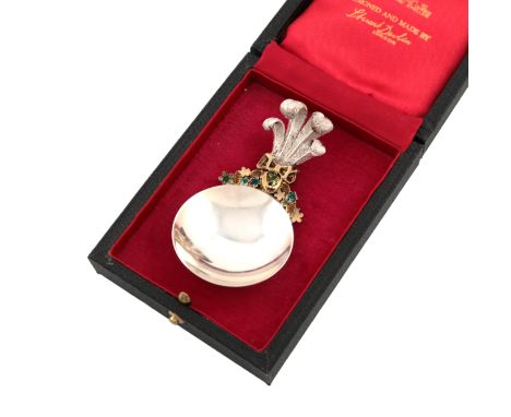 By Stuart Devlin, a modern parcel-gilt silver and enamel commemorative caddy spoon, London 1984, limited edition number 38, c