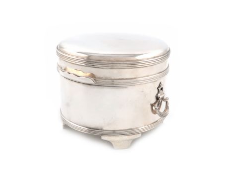 A silver biscuit box, by R. Comyns, London 1946, retailed by Carrington and Co, circular form, reeded borders, the hinged cov