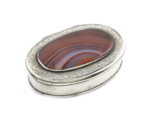 An 18th century silver and agate snuff box, unmarked circa 1760, oval form, the hinged cover set with an agate panel, and wit