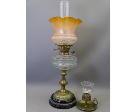 VICTORIAN OIL LAMP with clear glass font and duplex wick turners and decorative glass shade with a vintage brass chamber stic