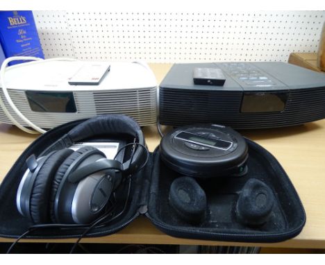 TWO BOSE WAVE RADIOS, a PM-1 compact disc player and a pair of Quiet Comfort II headphones E/T