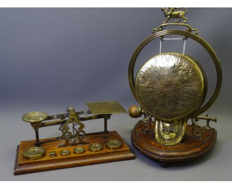 SET OF OAK &amp; BRASS 'INDIA &amp; COLONIES' MARKED POSTAL SCALES with a Queen Victoria embossed brass and oak dinner gong