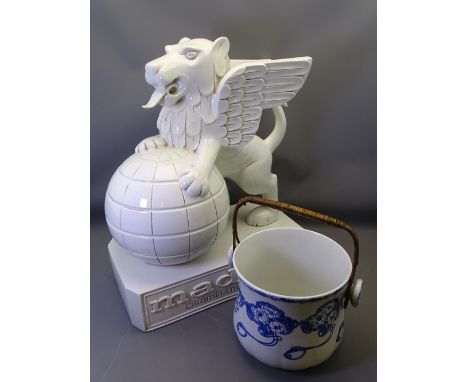 WHITE CERAMIC ADVERTISING LION for 'Madras World Prestigious Italian Shoe Manufacturer', depicting a winged lion from the ori