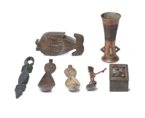 An Ifuago spoonPhilippinesthe handle carved as a standing figure,14cm long,two Boni spoons, 24cm and 19cm long, a Maori box a