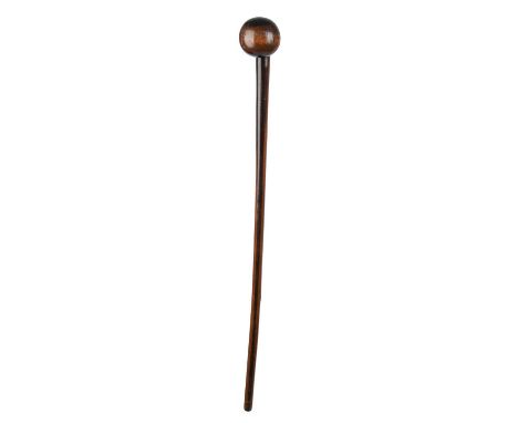 A Zulu knobkerrieSouth Africawith an off centre spherical head and with three notches to the top of the shaft, the end of the