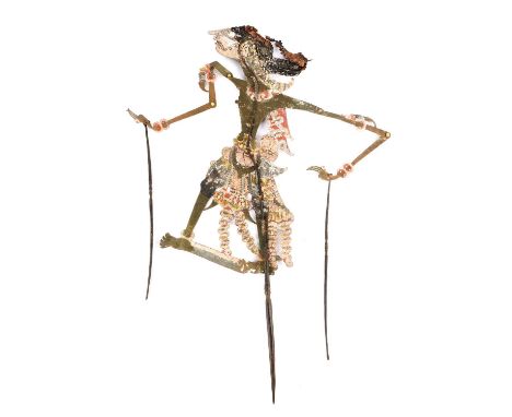 A Java wayang kulit shadow puppetIndonesiapainted cut out leather with horn supports, representing a noble prince,57cm long.