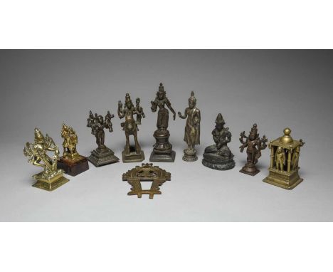 A group of Indian devotional figuresbronze, brass and silver coloured metal, including Parvati holding an object in her right