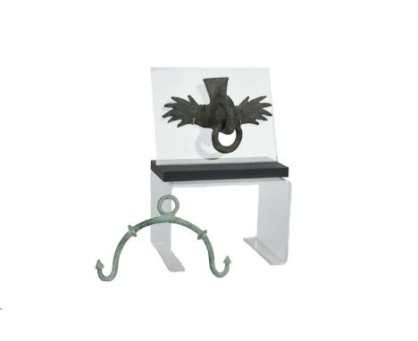 A Greek bronze handlecirca 5th / 4th century BCmodelled as a swan with incised decoration and a ring within the neck,21cm wid