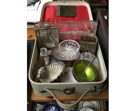 A lady's vanity case containing cut glass dressing table items, a silver chased and repousse clothes brush, mirror, etc 