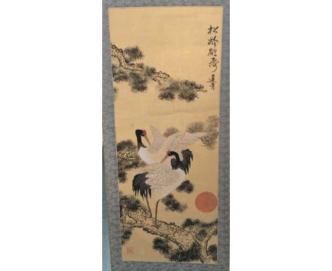 A Chinese scroll depicting two cranes at sunset and character marks 