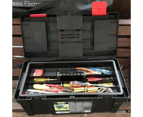 A plastic toolbox containing a quantity of tools 